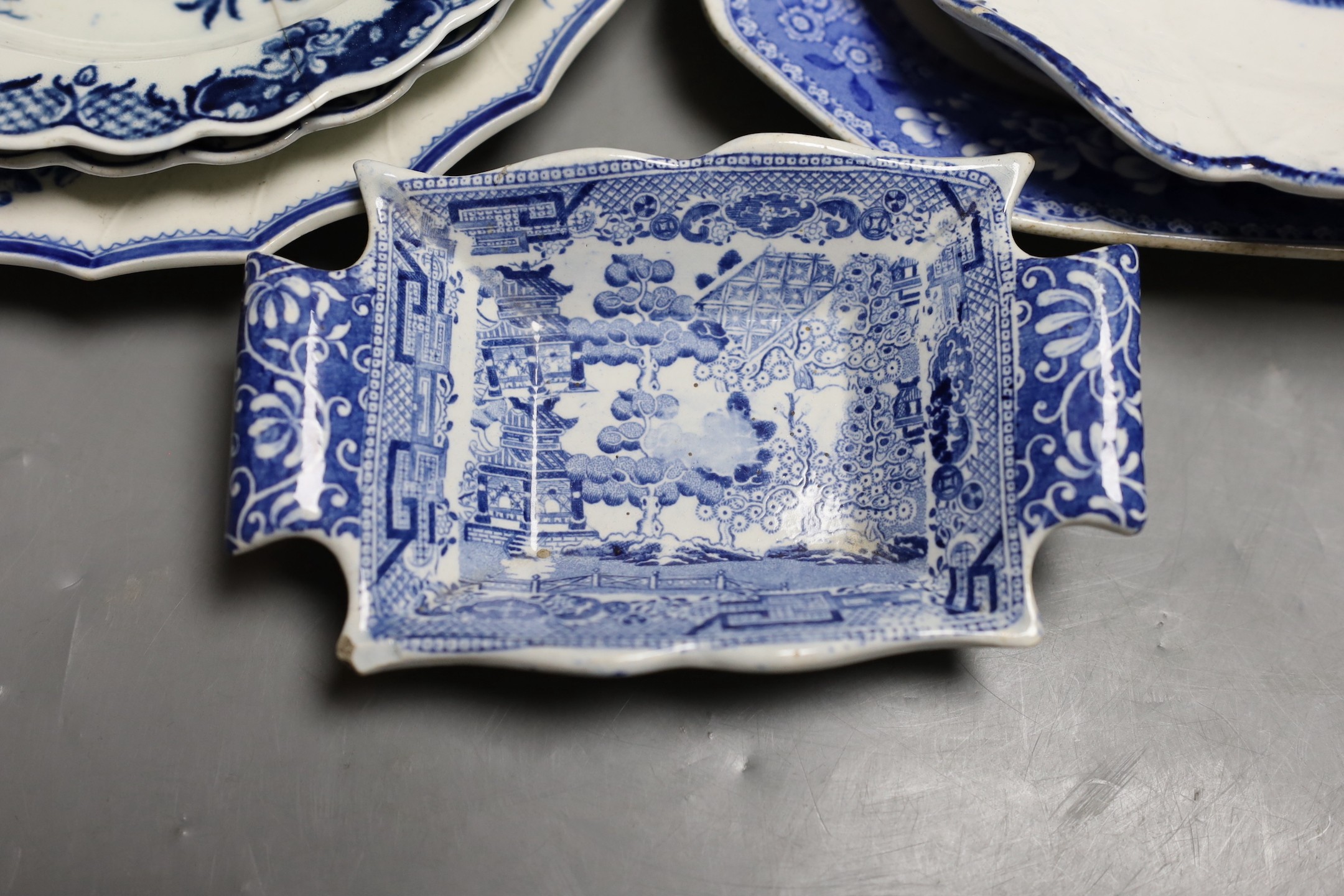 A Bow blue and white dish, 19.5cm, three Worcester blue and white plates, late 18th century and three 19th century blue and white pottery dishes